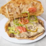 صوره عن طريقة عمل الحواوشي باللحمة والجبنة الرومي
