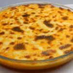 صوره عن طريقة عمل البطاطا بالبشاميل في الفرن بالطريقة الفلاحي